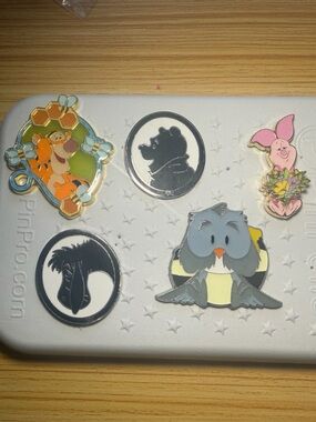 Disneys Winnie the Pooh Pin Lot+ Pin Folio